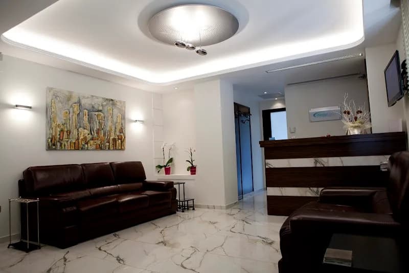THE DENTAL CLINIC. Dr. Rallis Markos
